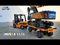 
              1583 towing excavator on trailer
            